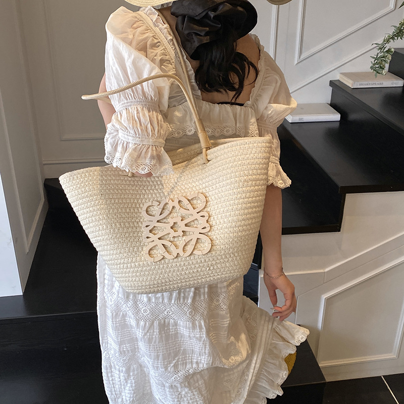 حقيبة يد منسوجة على الطراز الف - مراجعة Luxury Beach Bags Ysl وسعره