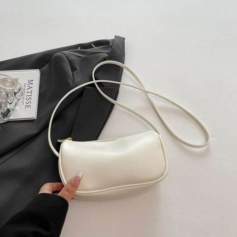 حقيبة حفاضات أنيقة بلون موحد،  - مراجعة Luxury Bags Logo وسعره